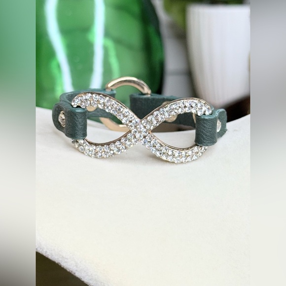 Green Faux Leather Bracelet w/ Crystal Infinity Symbol & Snap Closure - Picture 1 of 10